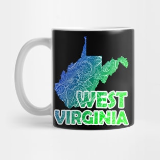 Colorful mandala art map of West Virginia with text in blue and green Mug